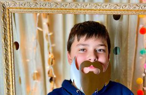 Son creating his own photo booth